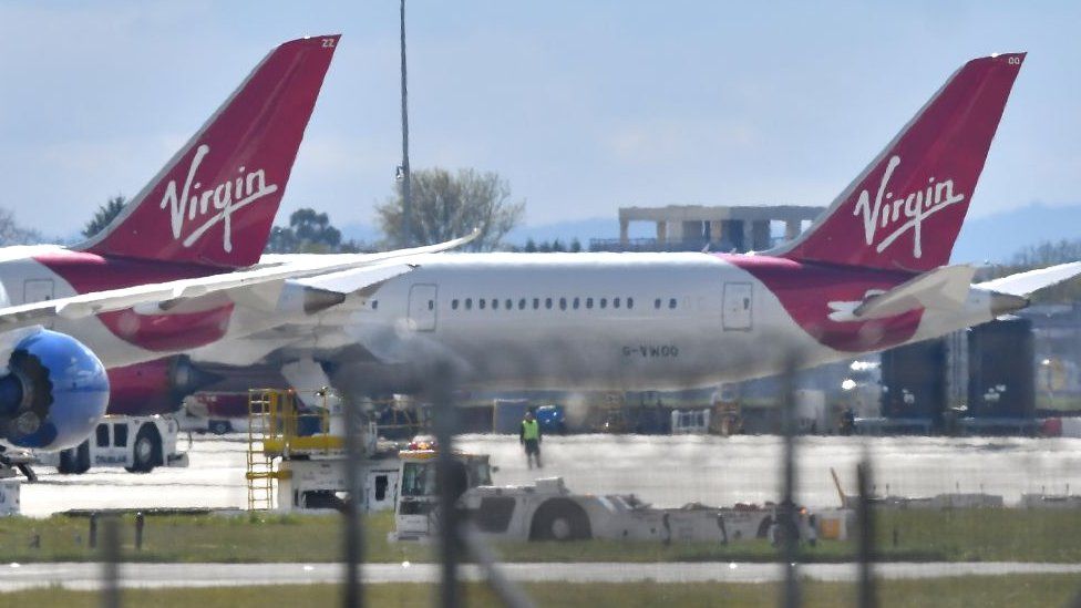 Parked Virgin Atlantic planes at Heathrow Airport