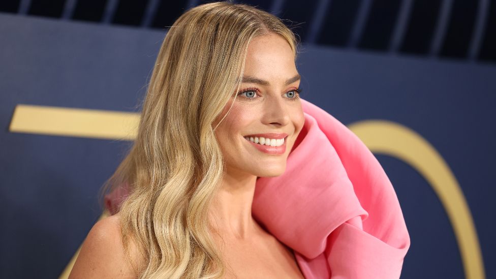 Australian actress Margot Robbie arrives for the 30th Annual Screen Actors Guild awards at the Shrine Auditorium in Los Angeles, February 24, 2024.