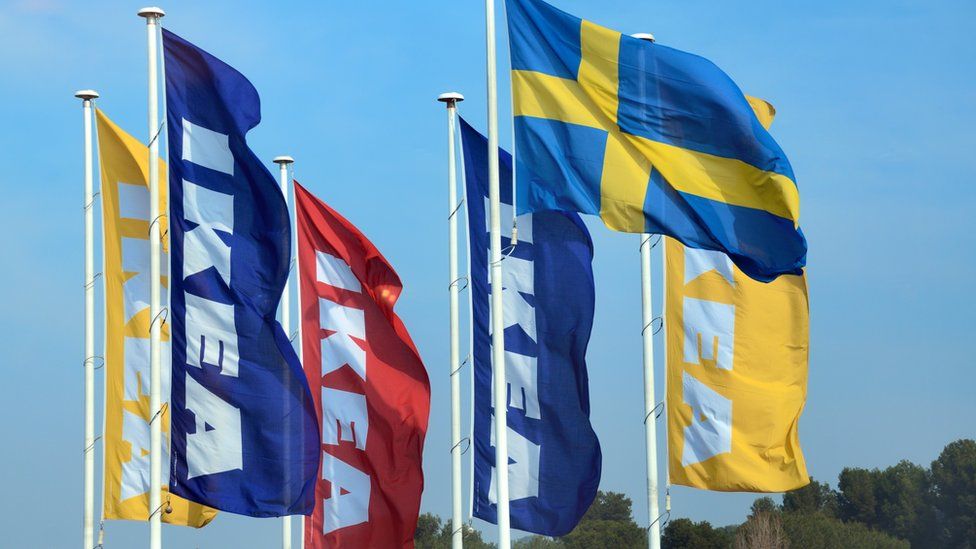 This is a photo of the signature IKEA flags that are raised outside of their UK stores.