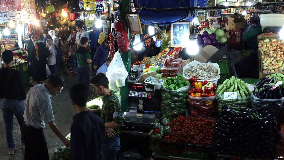 Iranians shop at the Tajrish Bazaar in the capital Tehran