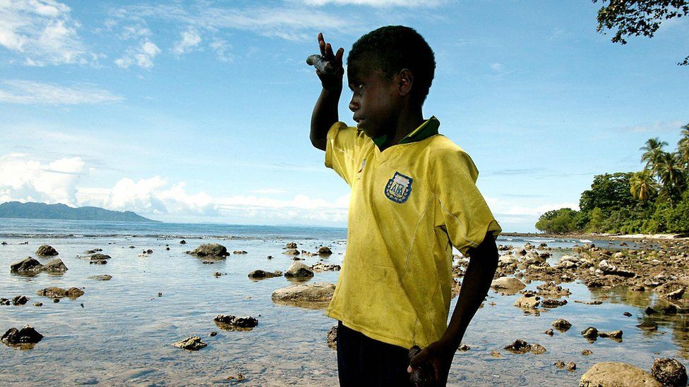 Solomon Islands boy at beach