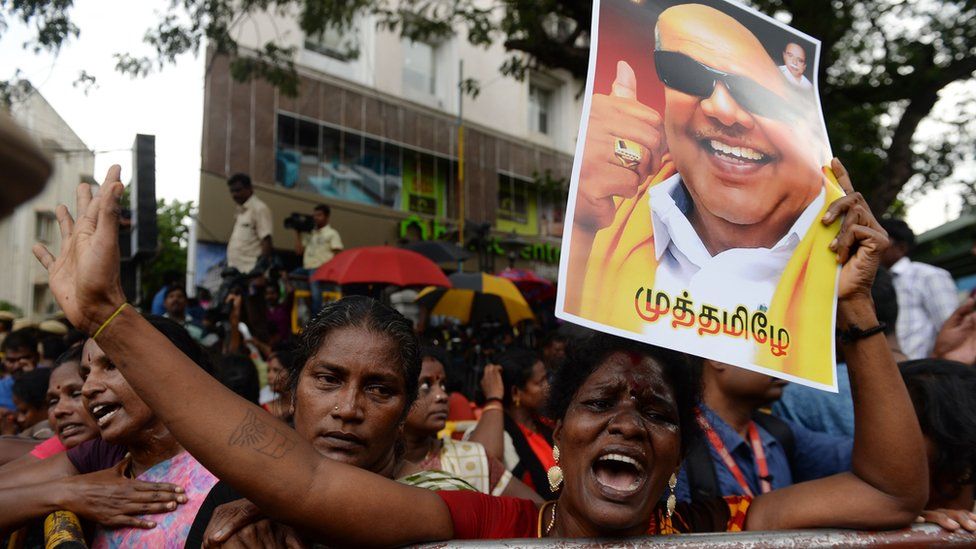 Dravida Munnetra Kazhagam (DMK) party supporter reacts in front of hospital where party president M Karunanidhi died, in Chennai on August 7, 2018
