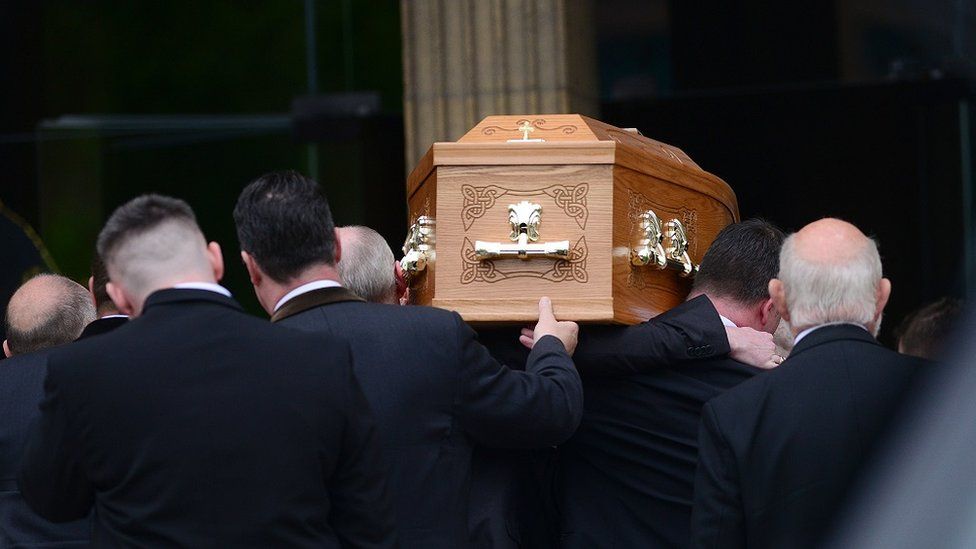 Lyra McKee's coffin is carried into the church