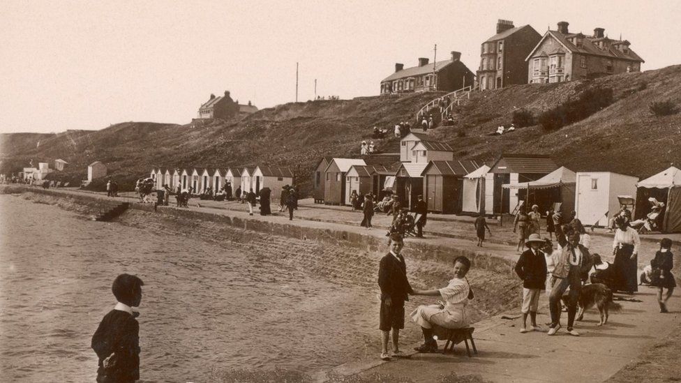 people on the beach in 1904