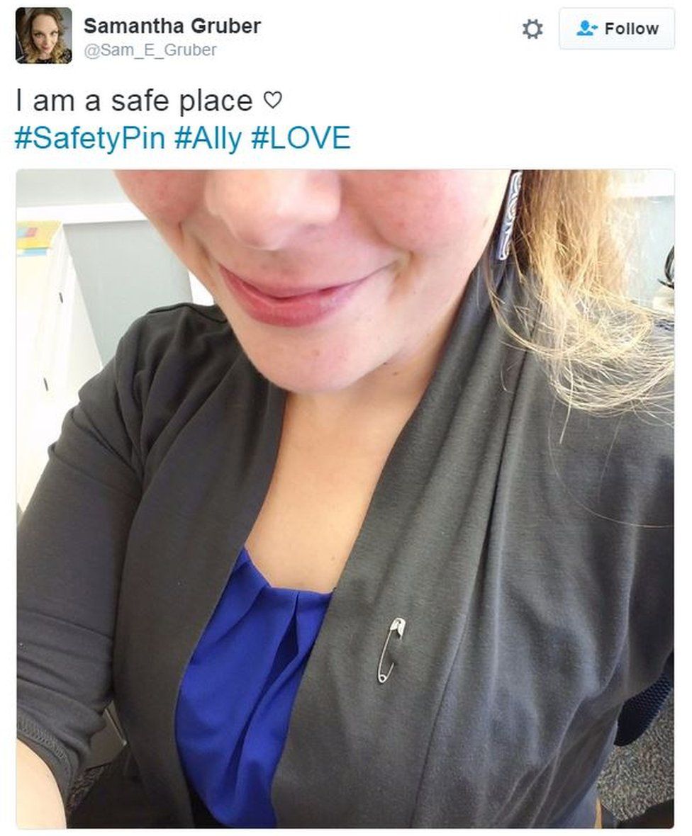 Tweet from user @Sam_E_Gruber reads: "I am a safe place" and shows a picture of her wearing a safety pin