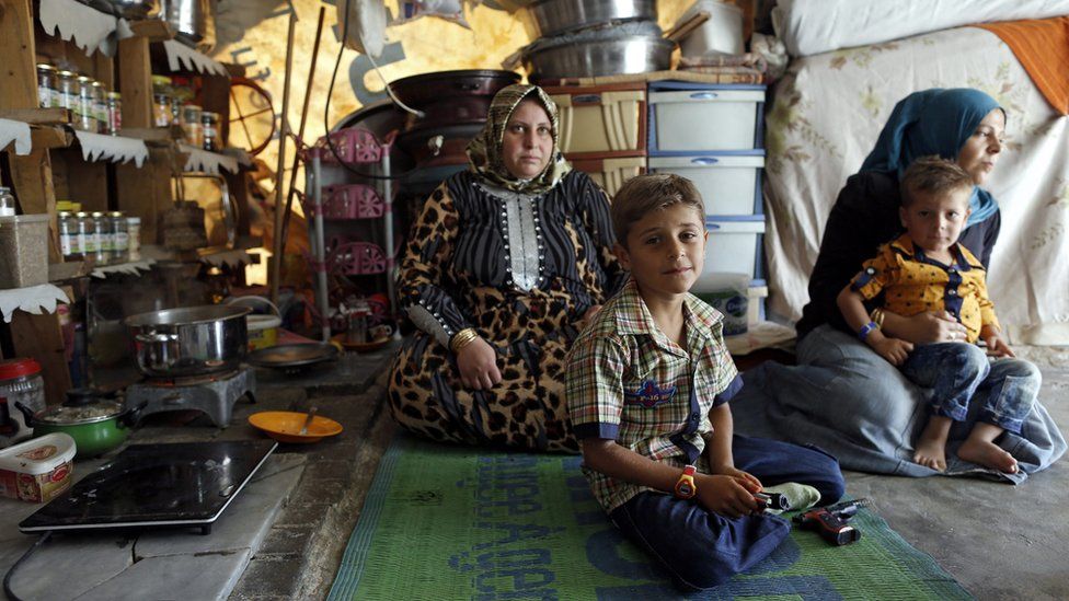 A Syrian family at a refugee camp in Sanliurfa, Turkey