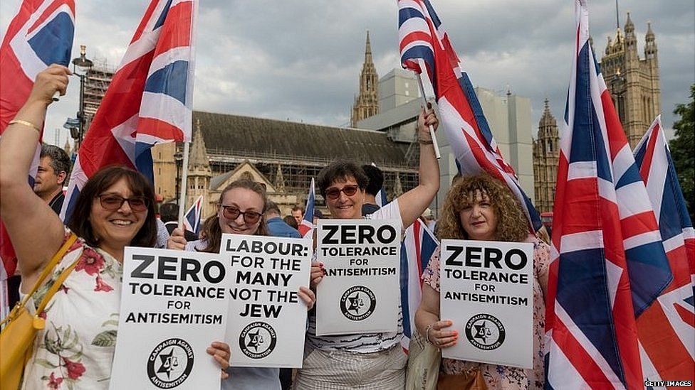 Members of the Campaign against anti-Semitism demonstrate outside Parliament