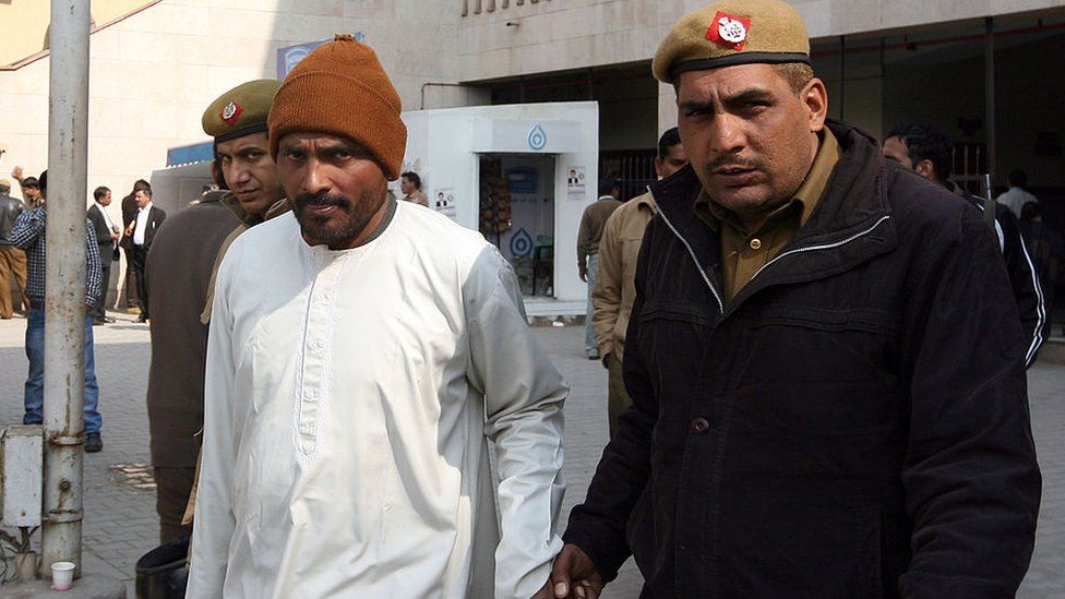 Serial Killer Chandrakant Jha outside Rohini courts complex on Friday, 03 February, 2012. He came to court to record his statement in a murder case against him.