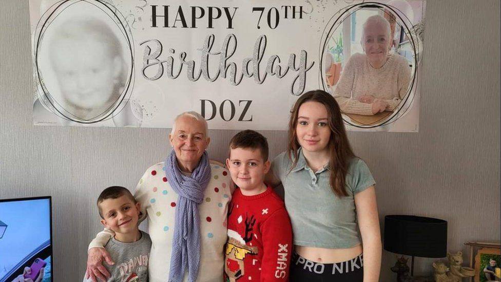 Doz Lee and her grandchildren