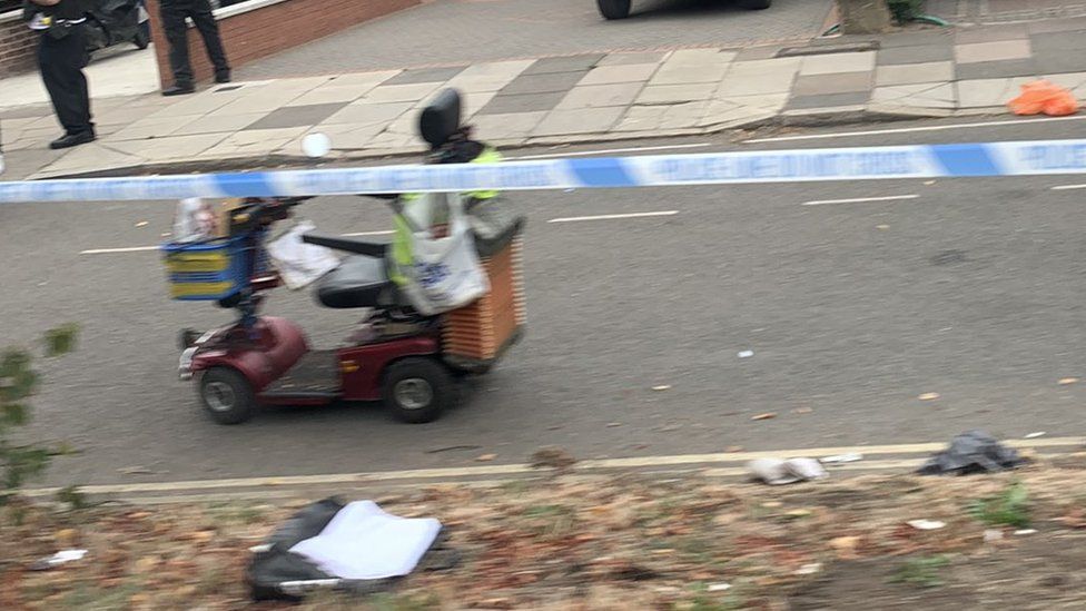 The victim's mobility scooter in the road