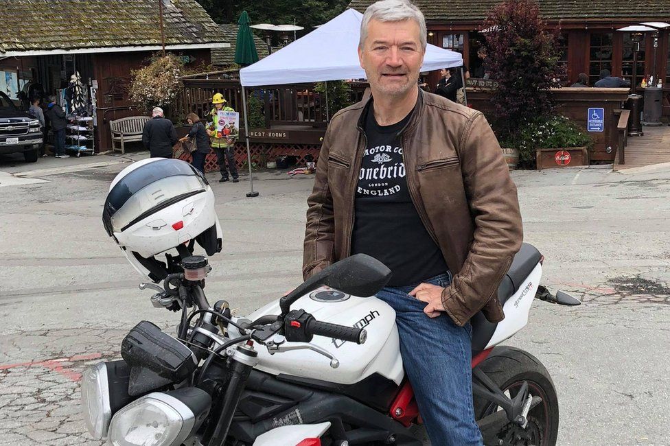 Anthony Shortland sitting on Triumph motorbike