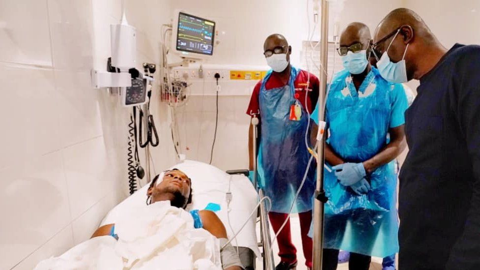 Lagos Governor Babajide Sanwo-Olu (R) visiting some of the injured in hospital - 21 October 2020
