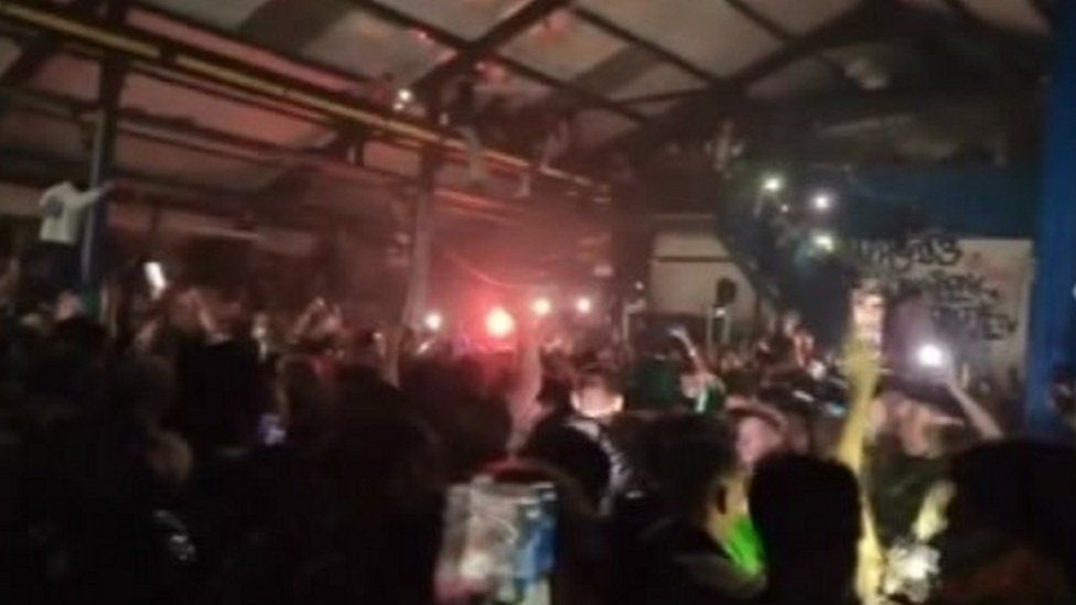 Police vehicles damaged as Wigan illegal rave shut down - BBC News