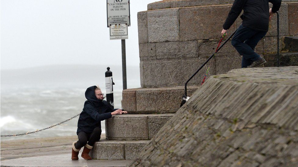 Battling through the heavy winds in Donaghadee, County Down, during Hurricane Ophelia