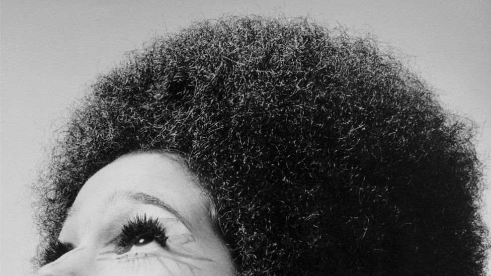 Woman with afro haircut in 1969