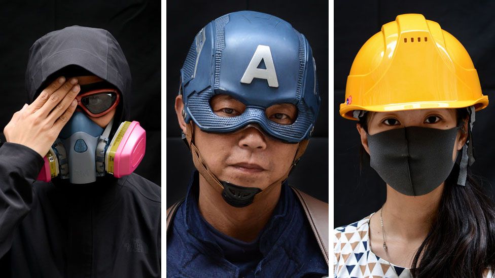 Protesters pose for a portrait during the Anti-Totalitarianism march in Causeway Bay, Hong Kong, 29 September 2019