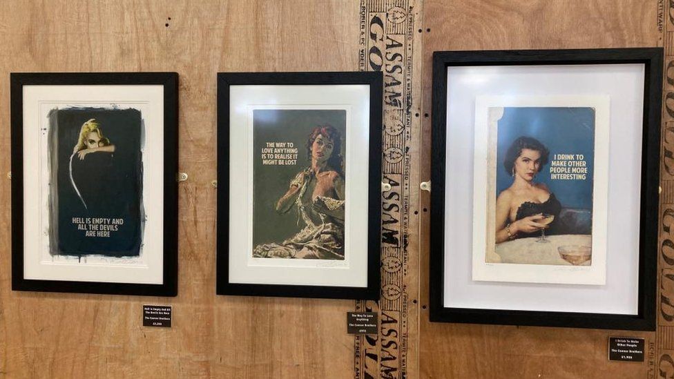 Three paintings showing women with various slogans including "I drink to make other people more interesting"