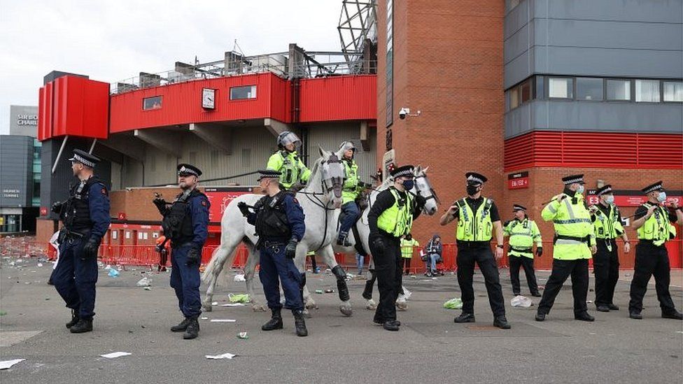 Police horses and officers outside Old Trafford