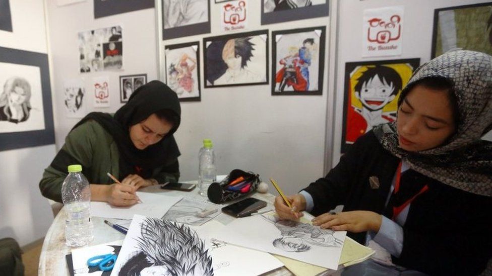 Artists at a stall during the Libya Comic Convention (02 November 2017|)