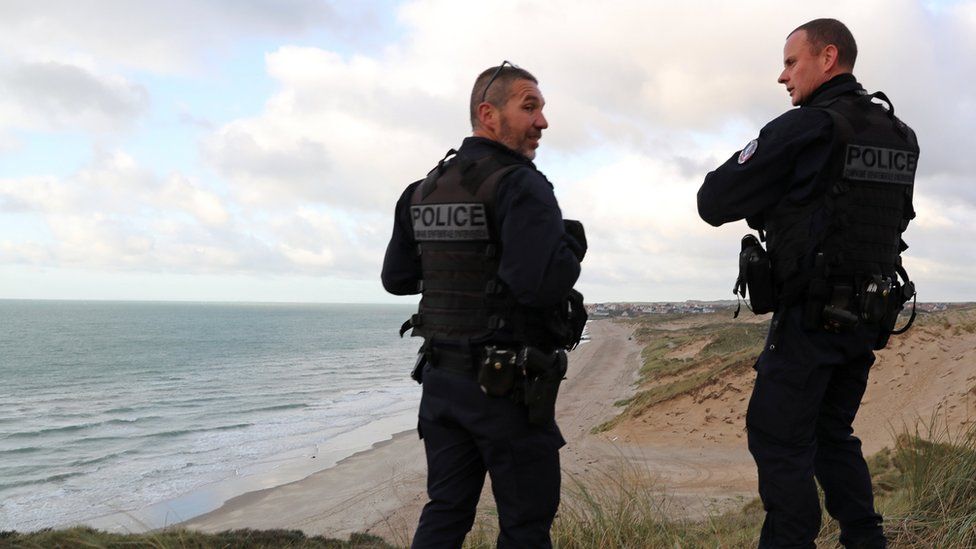 French police patrol the Slack dunes
