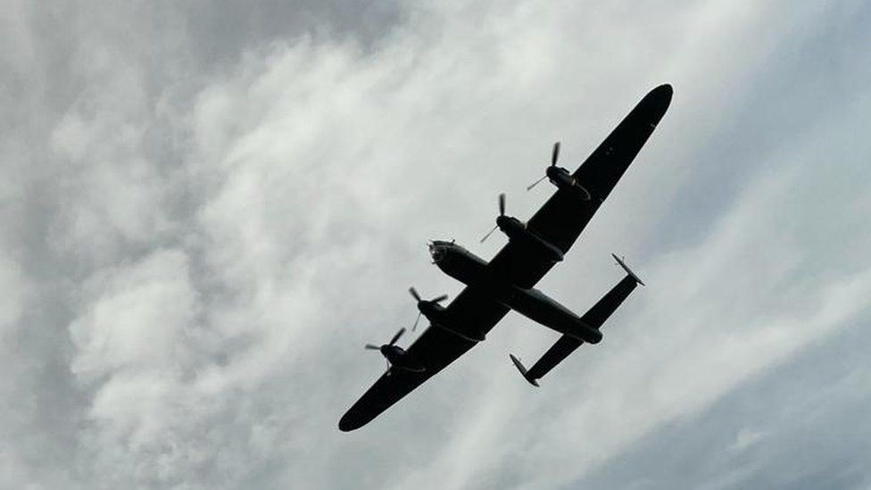 Lancaster bomber flying above in the sky