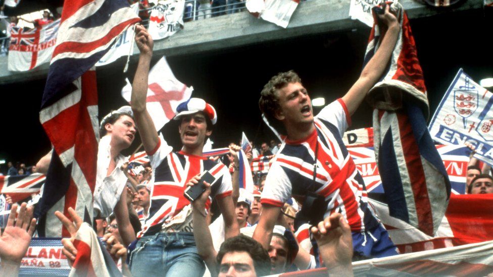 England fans in the stadium wave - and wear - the Union Jack as England take on Czechoslovakia at the 1982 World Cup