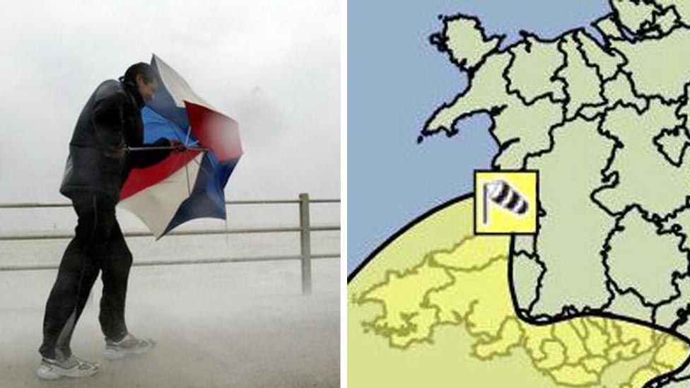 A man with an umbrella in the wind with a weather map