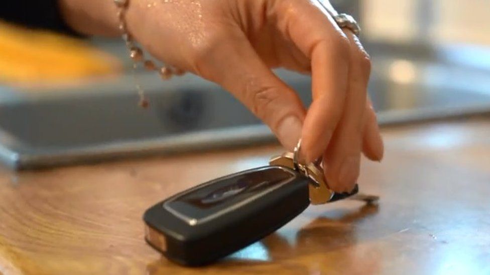 Close up hand with car keys