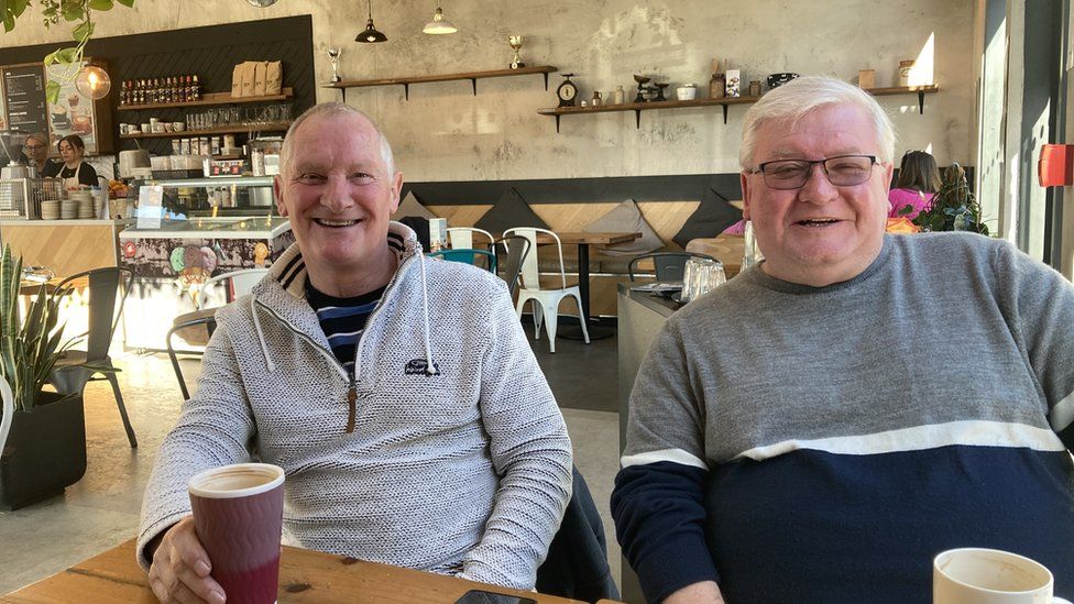 Bob Barry (L) and Robert Hutchings - sat at a table with coffees