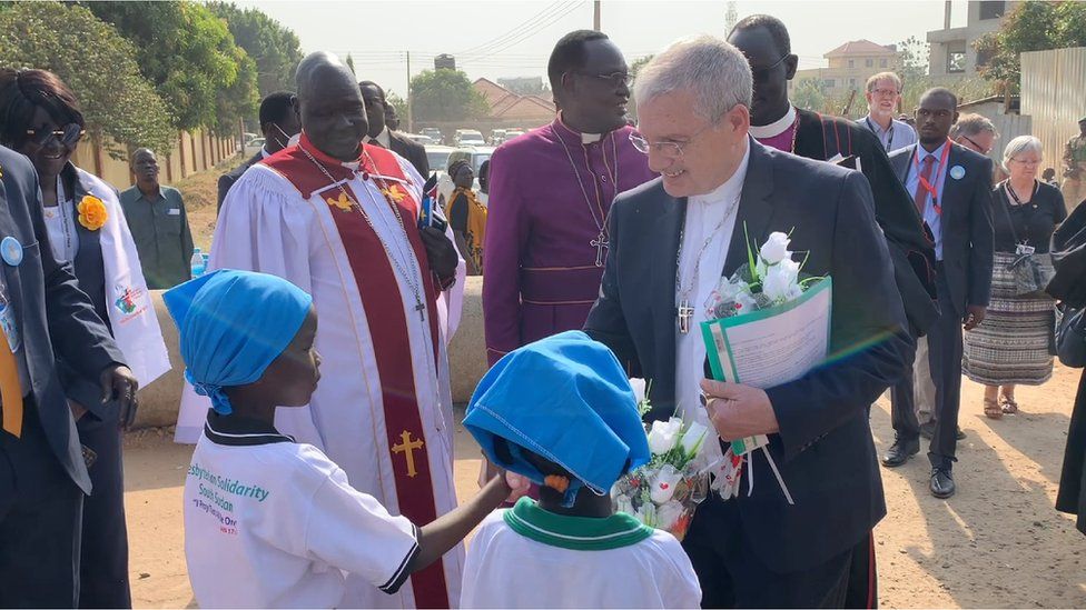 Rt Rev Dr Iain Greenshields is greeted by children in South Sudan