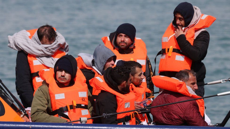 Migrants in a boar after being picked up in the channel by the Border Force