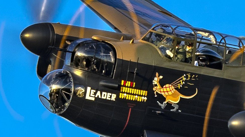 Close up of crew in Lancaster bomber