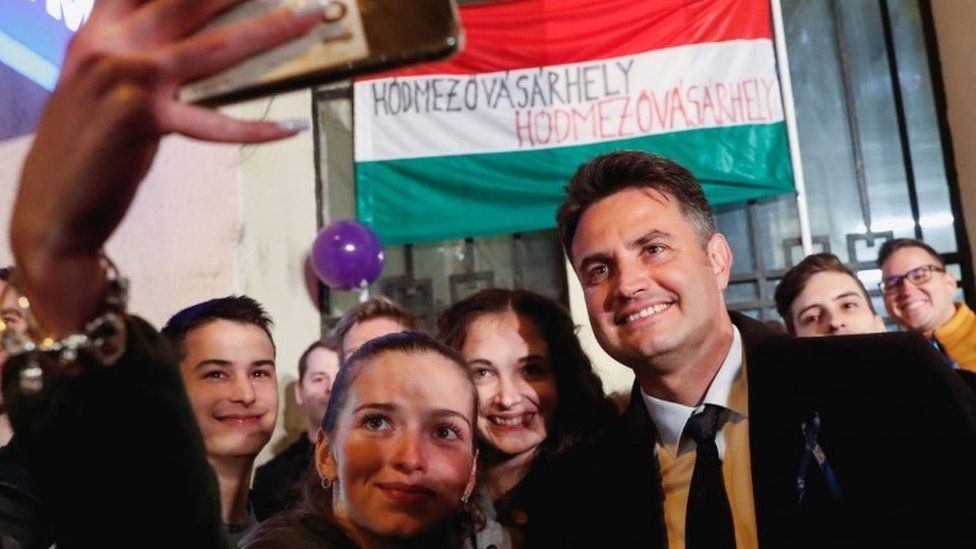 Opposition candidate for prime minister Peter Marki-Zay poses for a selfie with supporters