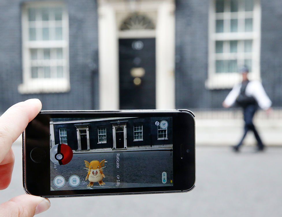 The Pokemon Go character Raticate on a mobile phone screen outside No 10 Downing St