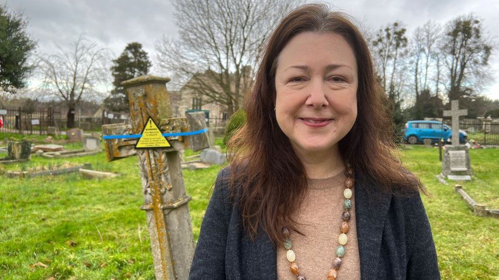 Councillor Chloe Turner standing in the graveyard