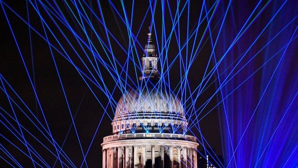 A light display to mark the New Year is seen over St Paul's Cathedral