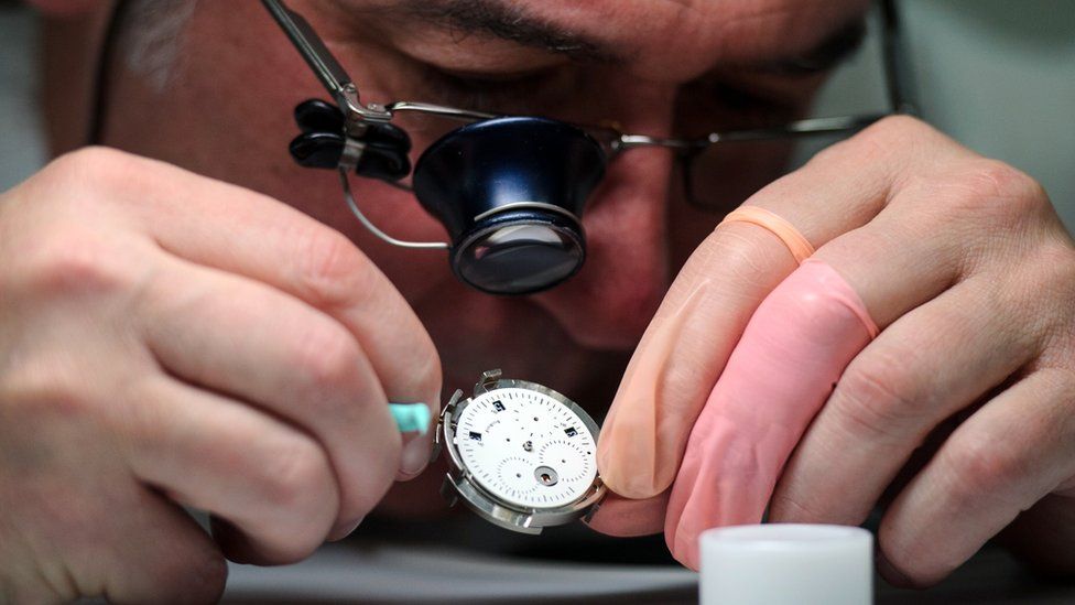 A worker at Swiss watch company Tag Heuer