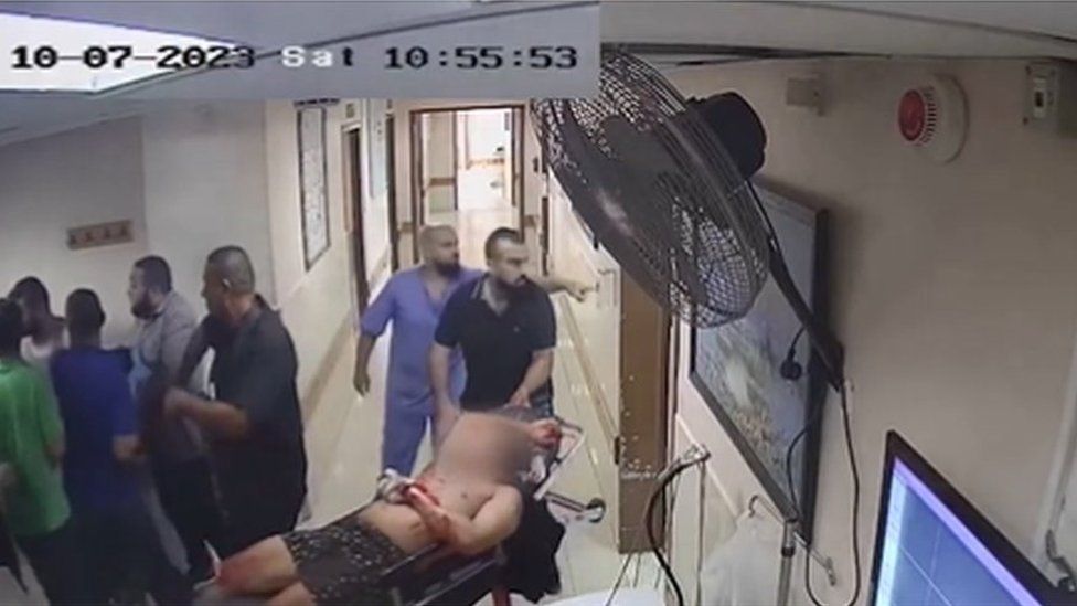 Footage released by the Israel Defense Forces purportedly showing one of the injured hostage at al-Shifa hospital in Gaza City