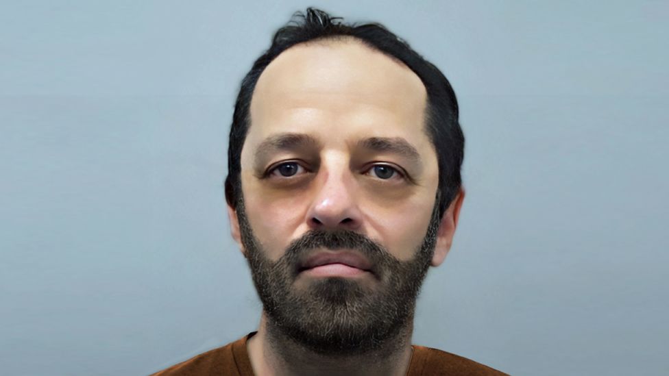 E-fit of Neil Maxwell depicting him with a slimmer face and dark beard