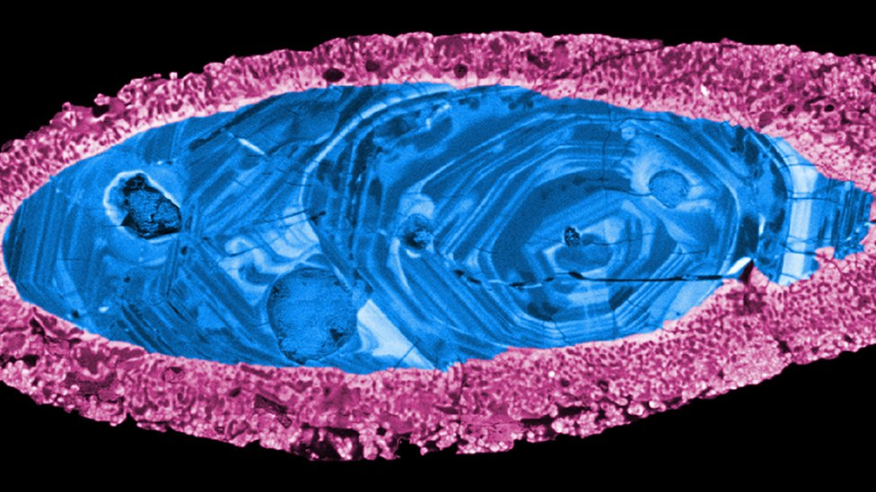 A shocked zircon crystal used to date the Yarrabubba impact. The margin (pink) re-crystallised during impact, leaving the inner core (blue) intact.