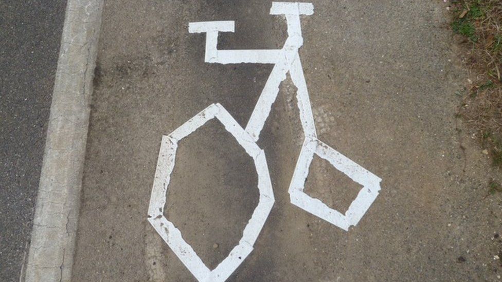 Crooked marking of a bike on a cycle path