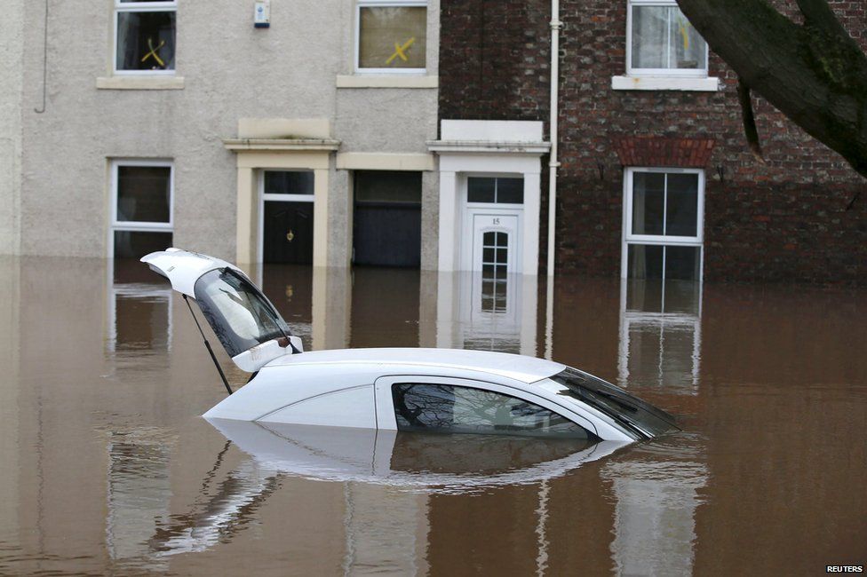 Car submerged in flood water