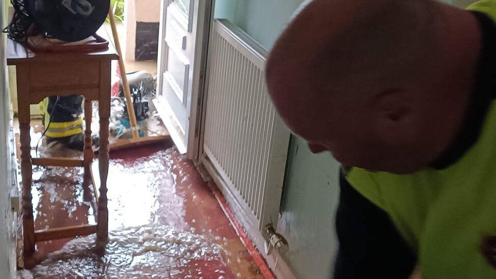 Clearing flooded property, Attleborough