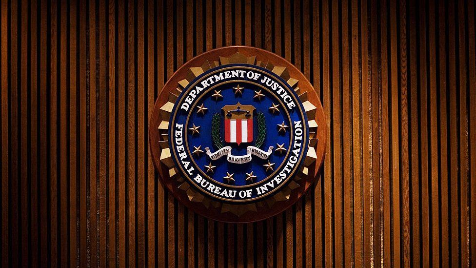 A photograph of the FBI shield