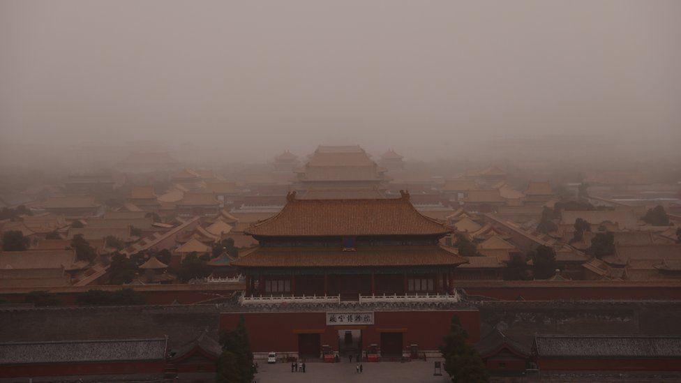 Forbidden City in Beijing is shrouded in yellow dust.