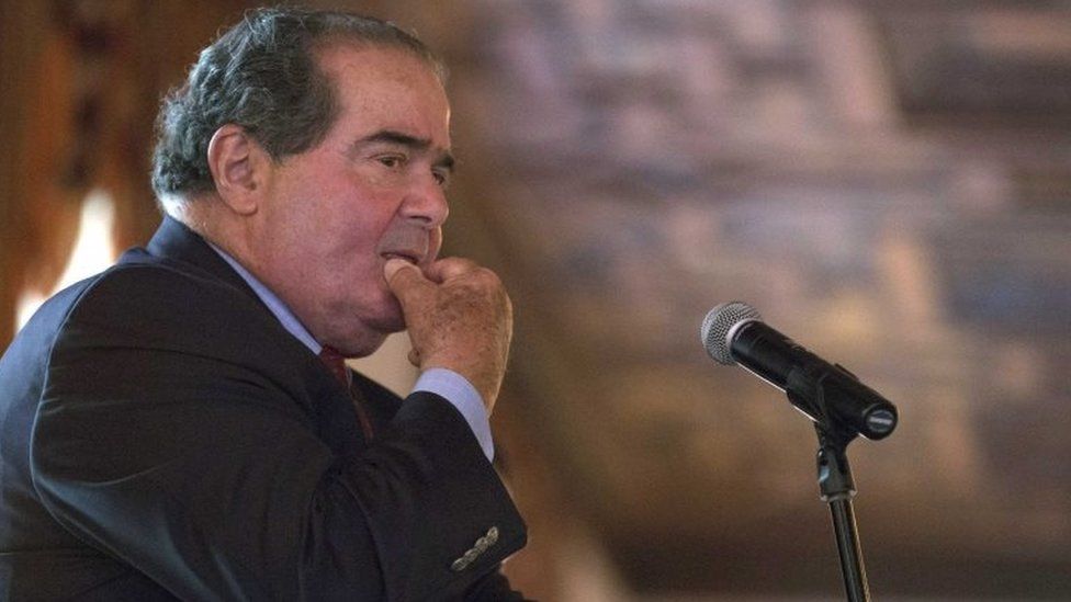 U.S. Supreme Court Justice Antonin Scalia listens to a question after speaking at an event sponsored by the Federalist Society at the New York Athletic Club in New York, on 13 October 2014