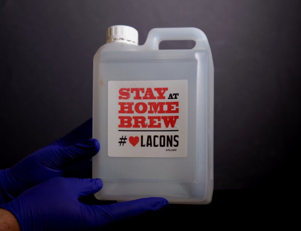 A jerry can with a Stay at Home Brew label on it from Lacons