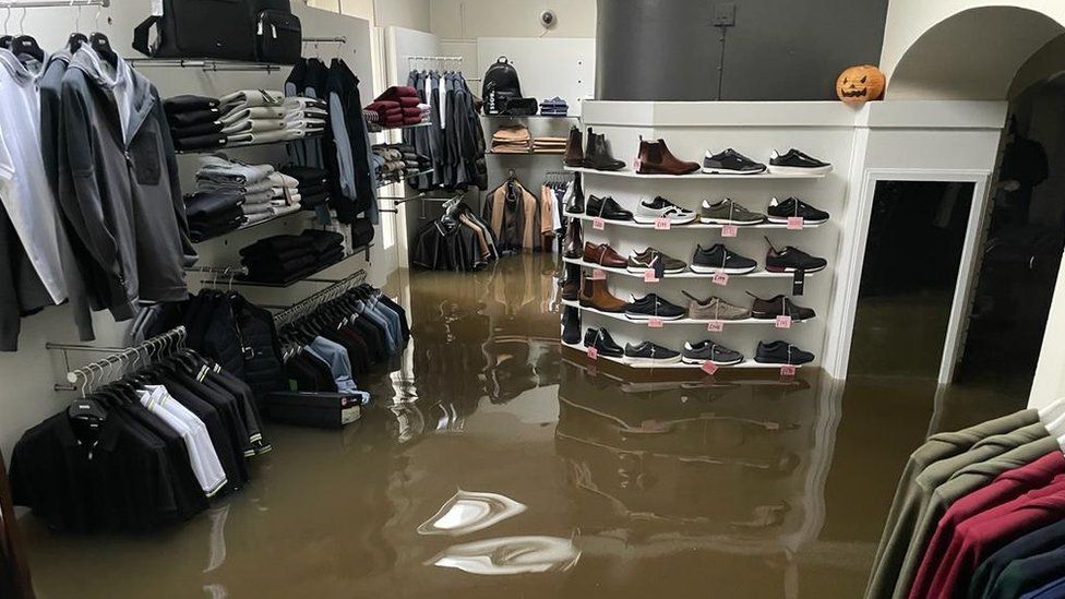 The flooded interior of McCartan Bros clothes shop in Newry