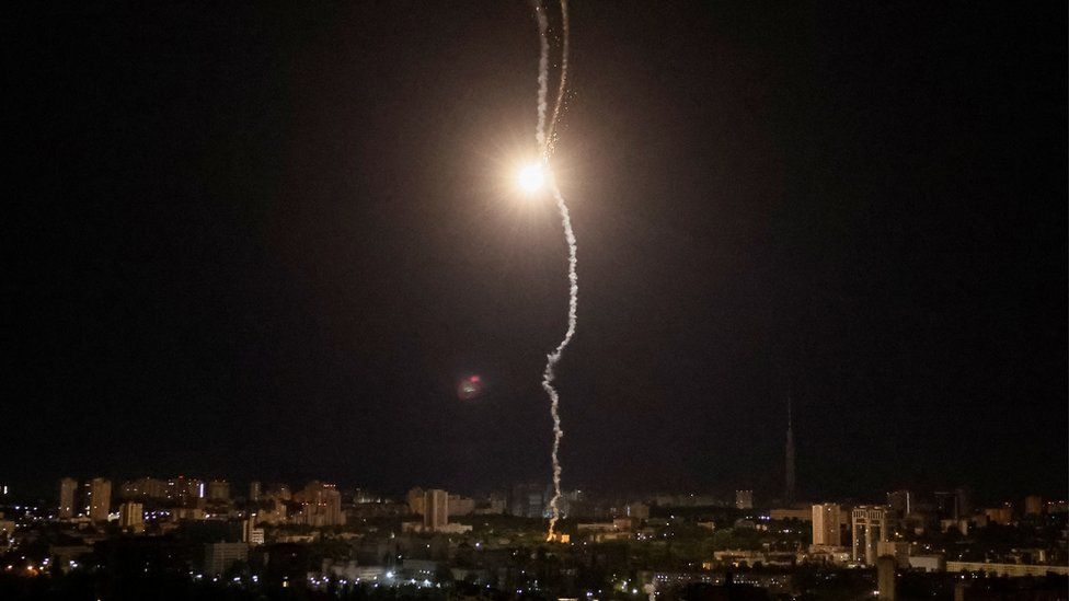Explosion of a missile is seen in the sky over Kyiv