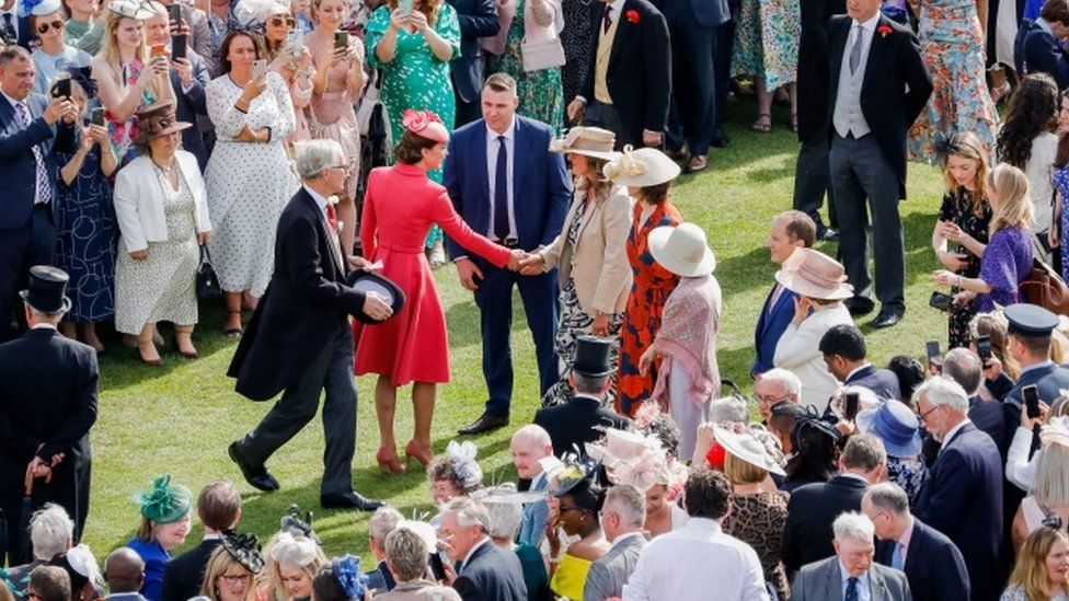 The Duchess of Cambridge meets guests during a Royal Garden Party at Buckingham Palace